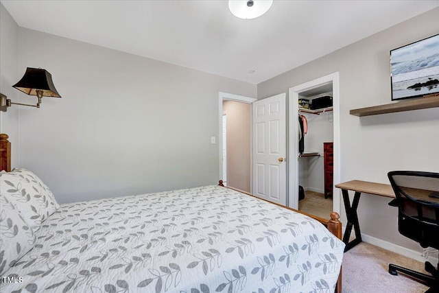 105 Wittenham Dr, Cary, NC 27519 - bedroom featuring light colored carpet, baseboards, and a spacious closet