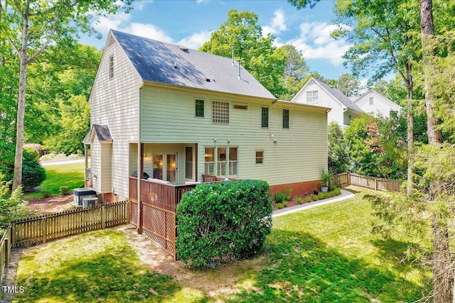 105 Wittenham Dr, Cary, NC 27519 - rear view of property with cooling unit, a shingled roof, and a deck
