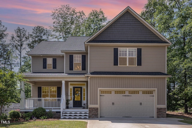 180 Long Grass Dr, Smithfield, NC 27577 - craftsman-style house with covered porch, concrete driveway, and roof with shingles