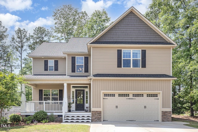 180 Long Grass Dr, Smithfield, NC 27577 - craftsman inspired home with a shingled roof, an attached garage, a porch, and driveway