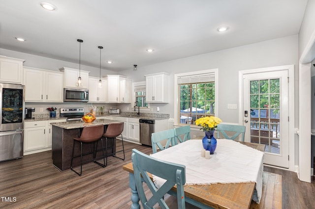 180 Long Grass Dr, Smithfield, NC 27577 - dining area featuring recessed lighting and dark wood-type flooring