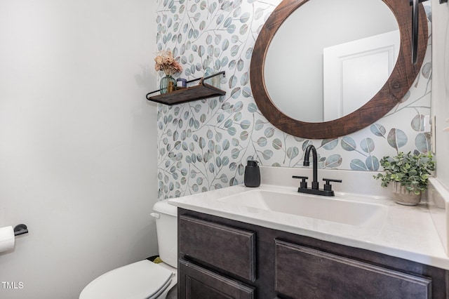 180 Long Grass Dr, Smithfield, NC 27577 - bathroom featuring vanity, toilet, and wallpapered walls