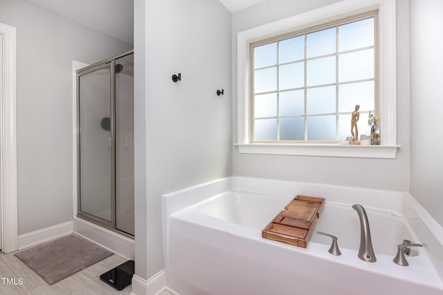 180 Long Grass Dr, Smithfield, NC 27577 - bathroom with a shower stall and a bath