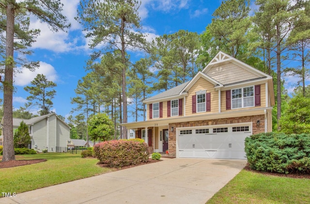 view of front of house featuring a garage, concrete driveway, and a front lawn