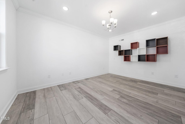empty room with recessed lighting, a chandelier, ornamental molding, and wood finished floors