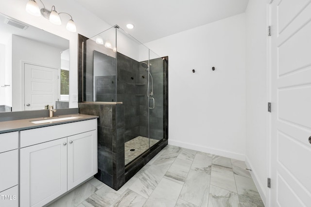 full bath featuring vanity, visible vents, marble finish floor, and a stall shower