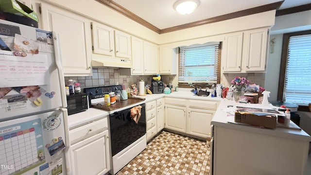 kitchen with crown molding, electric range, black microwave, freestanding refrigerator, and under cabinet range hood