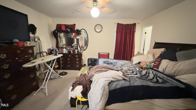 bedroom with carpet floors and a ceiling fan