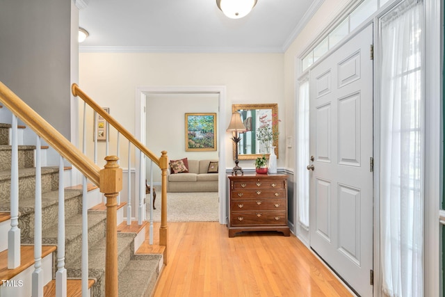 210 Presidents Walk Ln, Cary, NC 27519 - foyer featuring light wood-style floors, ornamental molding, and stairs