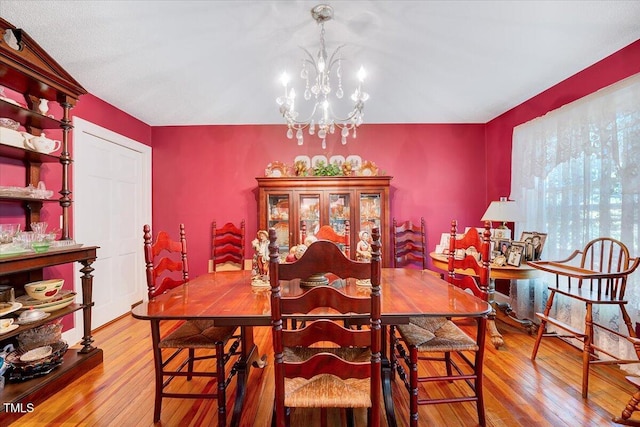 206 Kittys Ln, Erwin, NC 28339 - dining space with wood-type flooring and a notable chandelier