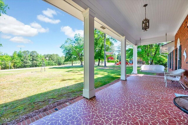 206 Kittys Ln, Erwin, NC 28339 - view of patio / terrace featuring covered porch