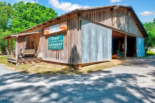 206 Kittys Ln, Erwin, NC 28339 - view of side of property featuring an outbuilding and an outdoor structure