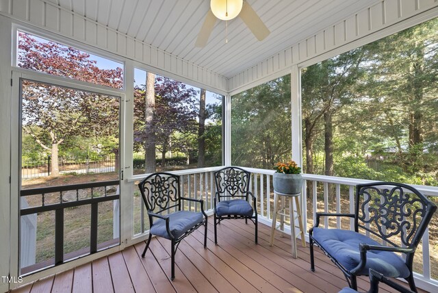 20 Paddy Ln, Youngsville, NC 27596 - sunroom / solarium featuring ceiling fan and view of wooded area