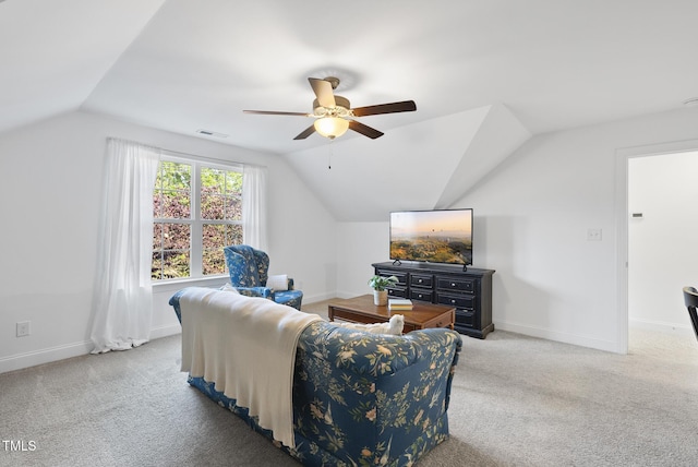20 Paddy Ln, Youngsville, NC 27596 - carpeted living room featuring lofted ceiling, a ceiling fan, and baseboards