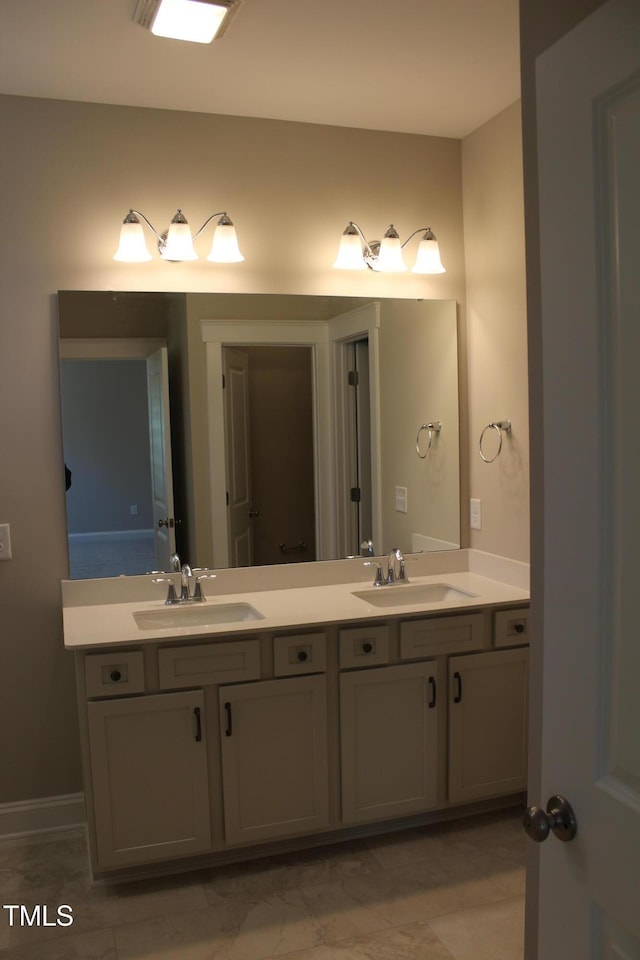 full bath with double vanity and a sink
