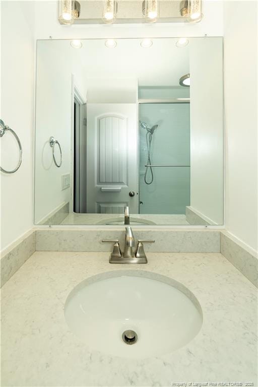 2513 Colgate Dr, Fayetteville, NC 28304 - bathroom with vanity and a shower