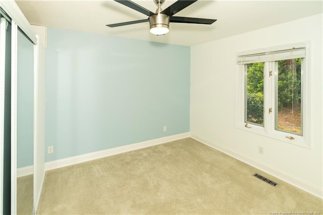 2513 Colgate Dr, Fayetteville, NC 28304 - carpeted empty room with a ceiling fan and baseboards