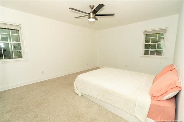 2513 Colgate Dr, Fayetteville, NC 28304 - carpeted bedroom with a ceiling fan and baseboards