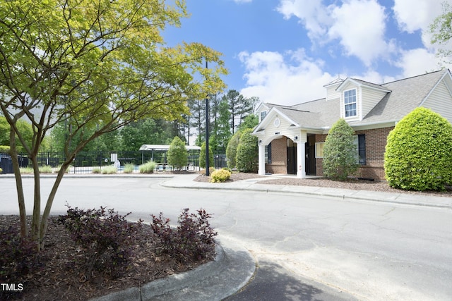 exterior space with sidewalks and curbs