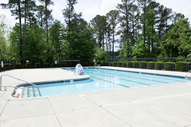 community pool with fence