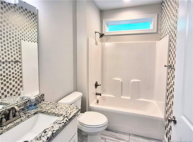 full bathroom with vanity, toilet, and bathing tub / shower combination
