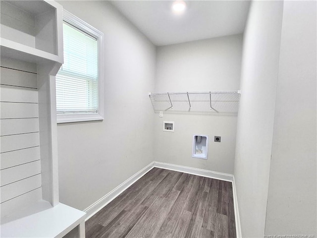 laundry area with laundry area, hookup for a washing machine, baseboards, hookup for an electric dryer, and dark wood-style floors