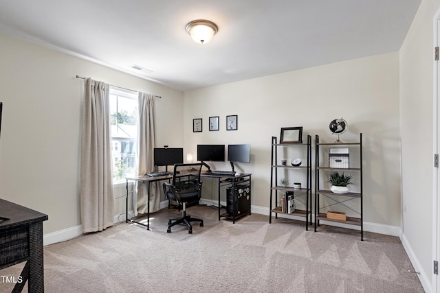 home office featuring carpet floors, baseboards, and visible vents