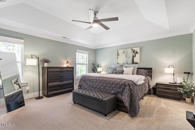 7729 Calcutta Dr, Willow Springs, NC 27592 - carpeted bedroom with ornamental molding, ceiling fan, a tray ceiling, and multiple windows