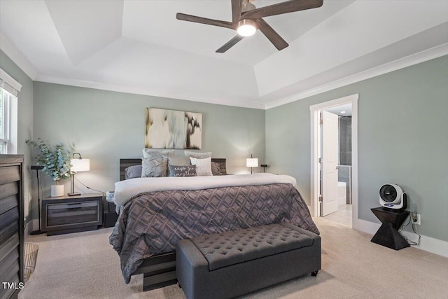 7729 Calcutta Dr, Willow Springs, NC 27592 - bedroom with crown molding, connected bathroom, a tray ceiling, a ceiling fan, and carpet