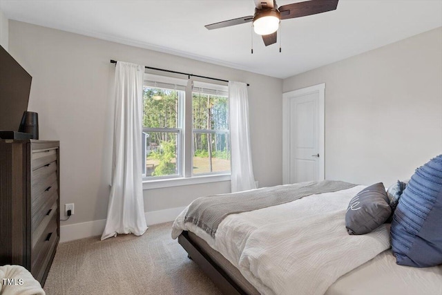 7729 Calcutta Dr, Willow Springs, NC 27592 - carpeted bedroom featuring a ceiling fan and baseboards