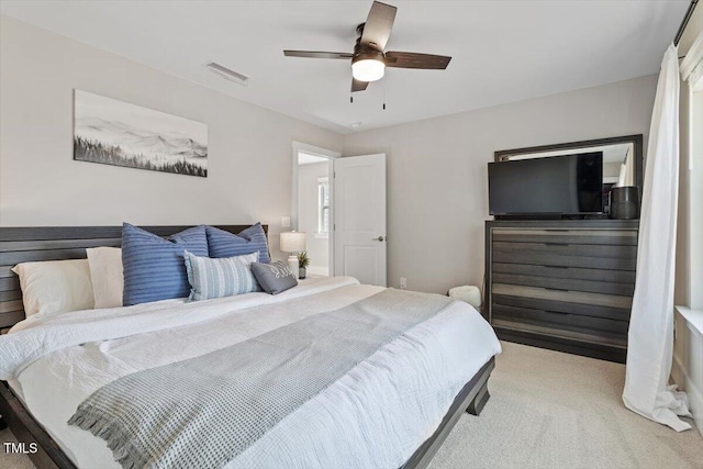 7729 Calcutta Dr, Willow Springs, NC 27592 - carpeted bedroom with visible vents and a ceiling fan