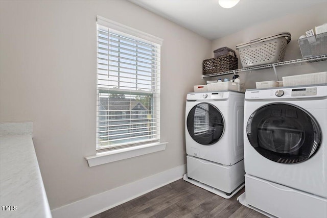 7729 Calcutta Dr, Willow Springs, NC 27592 - laundry room with laundry area, washer and clothes dryer, dark wood-type flooring, and a wealth of natural light
