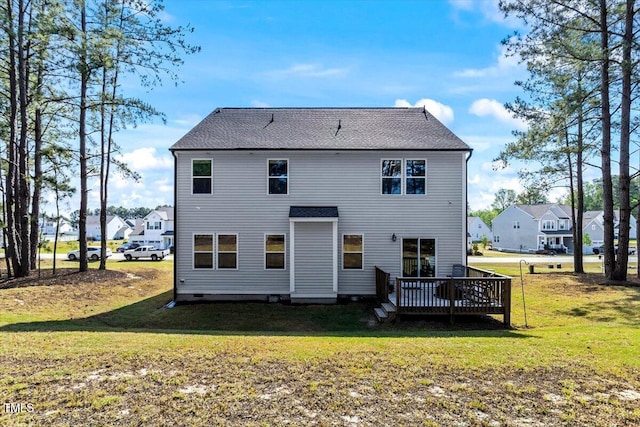 7729 Calcutta Dr, Willow Springs, NC 27592 - rear view of house featuring a lawn and a deck