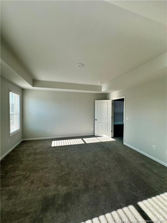 331 Brentmoor Dr, Raeford, NC 28376 - spare room with baseboards and dark carpet