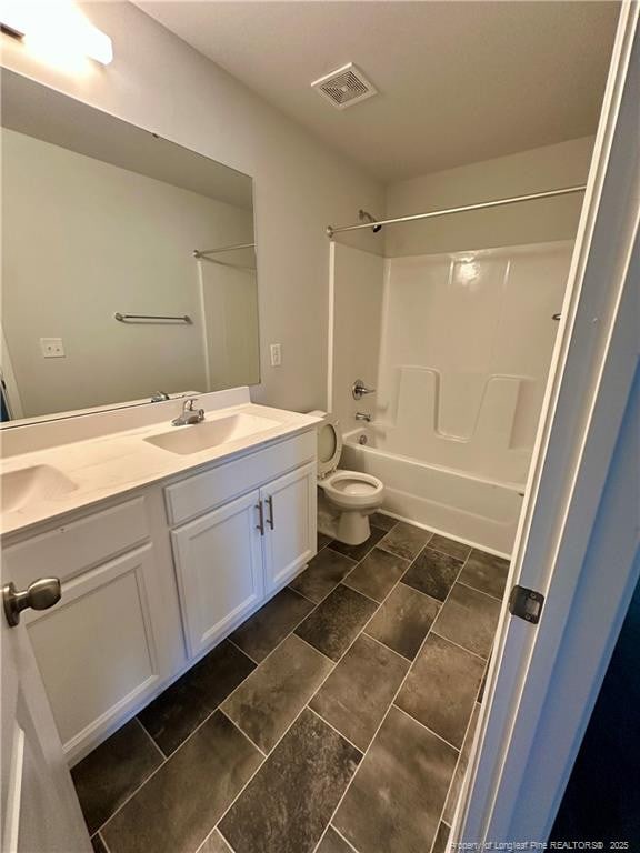 331 Brentmoor Dr, Raeford, NC 28376 - full bath with visible vents, a sink, double vanity, and toilet