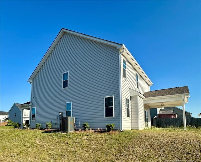 331 Brentmoor Dr, Raeford, NC 28376 - rear view of property with a yard and central AC