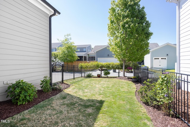 view of yard featuring a residential view and fence