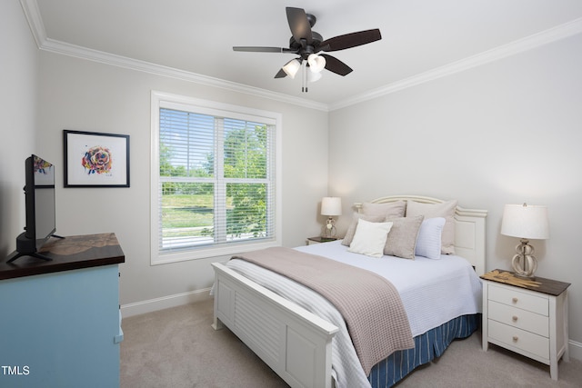 bedroom featuring a ceiling fan, baseboards, light carpet, and ornamental molding