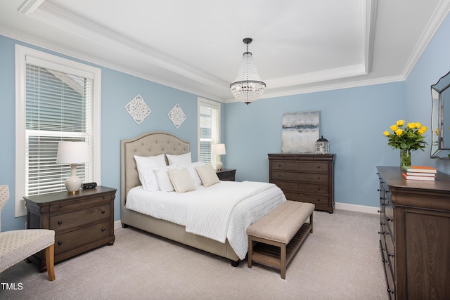 bedroom with crown molding, a raised ceiling, baseboards, an inviting chandelier, and light carpet