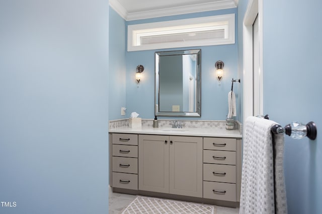 bathroom with vanity, ornamental molding, and tile patterned floors