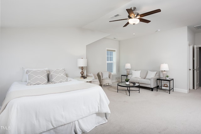 bedroom featuring visible vents, a ceiling fan, baseboards, and light carpet