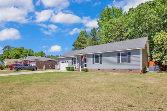ranch-style house featuring an attached garage, driveway, a front lawn, and crawl space