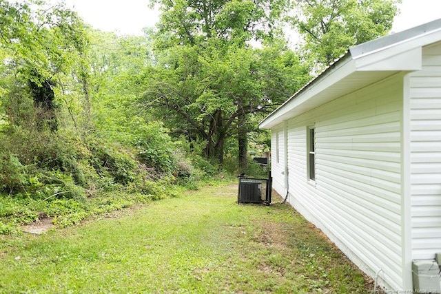 3254 Blossom Dr, Fayetteville, NC 28306 - view of yard featuring central air condition unit