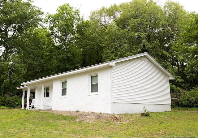 3254 Blossom Dr, Fayetteville, NC 28306 - view of property exterior with a lawn