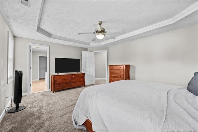 bedroom with baseboards, carpet, and a textured ceiling