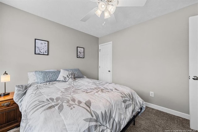 bedroom with baseboards, ceiling fan, and carpet