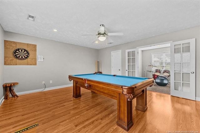 playroom featuring billiards, a ceiling fan, french doors, baseboards, and light wood finished floors