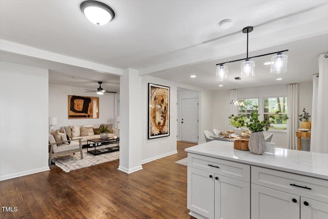 3907 Inwood Dr, Durham, NC 27705 - kitchen with baseboards, dark wood-style floors, light countertops, pendant lighting, and recessed lighting