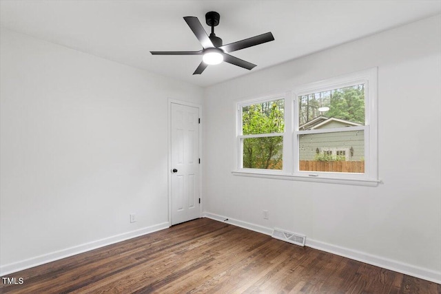 3907 Inwood Dr, Durham, NC 27705 - spare room featuring baseboards, wood finished floors, and ceiling fan