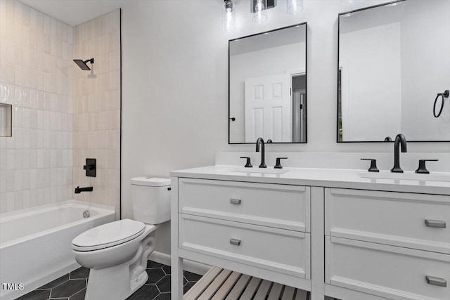 3907 Inwood Dr, Durham, NC 27705 - full bath featuring toilet, double vanity, tile patterned floors, and tub / shower combination